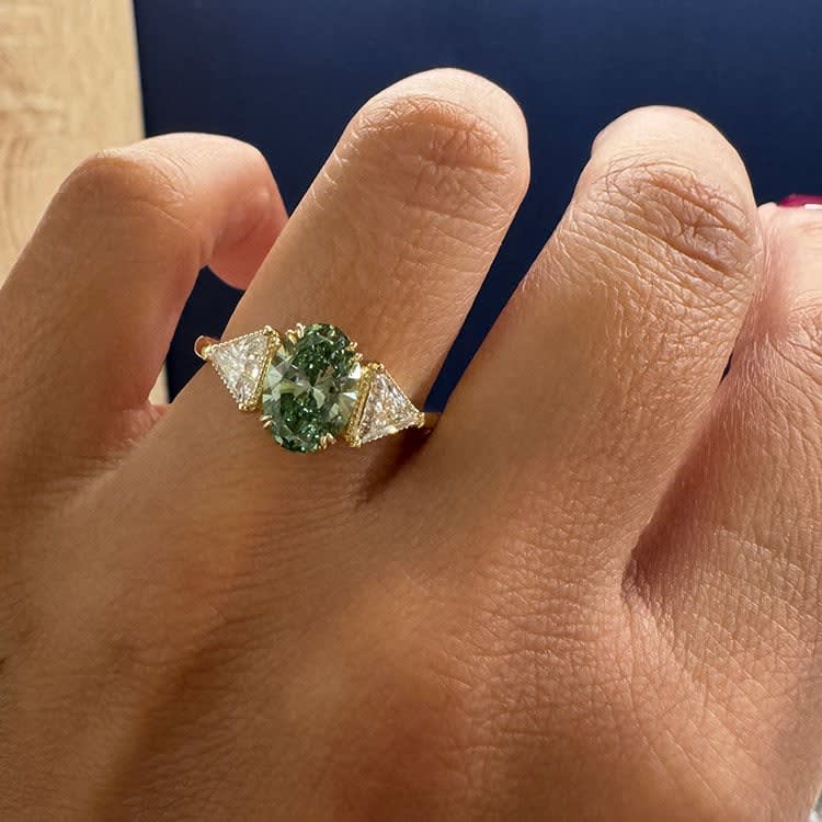 Lab green diamond trilogy ring
