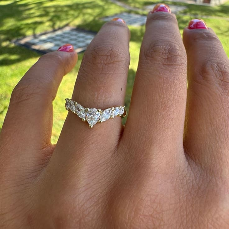 Fitted wedding band with pear and marquise diamond