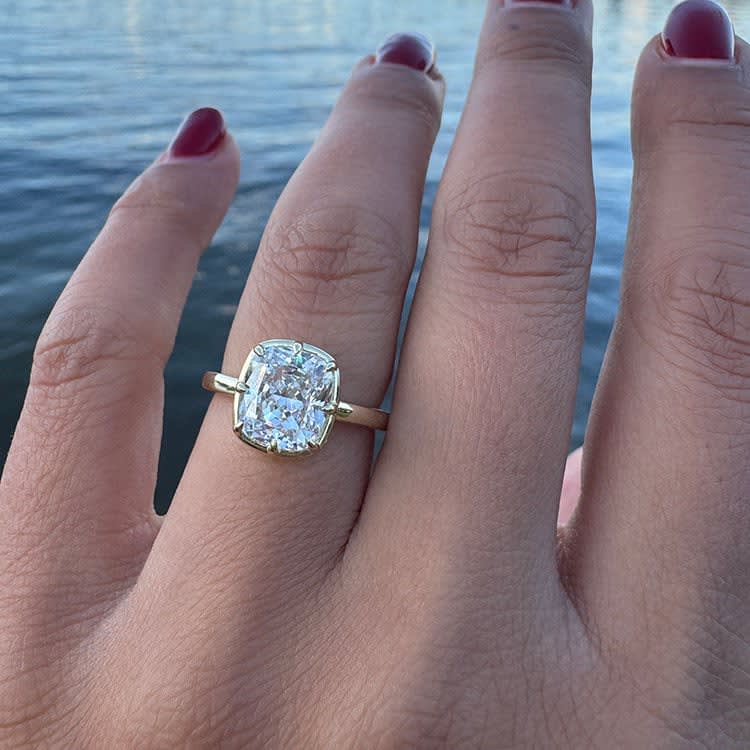 Cushion cut set on a solid band