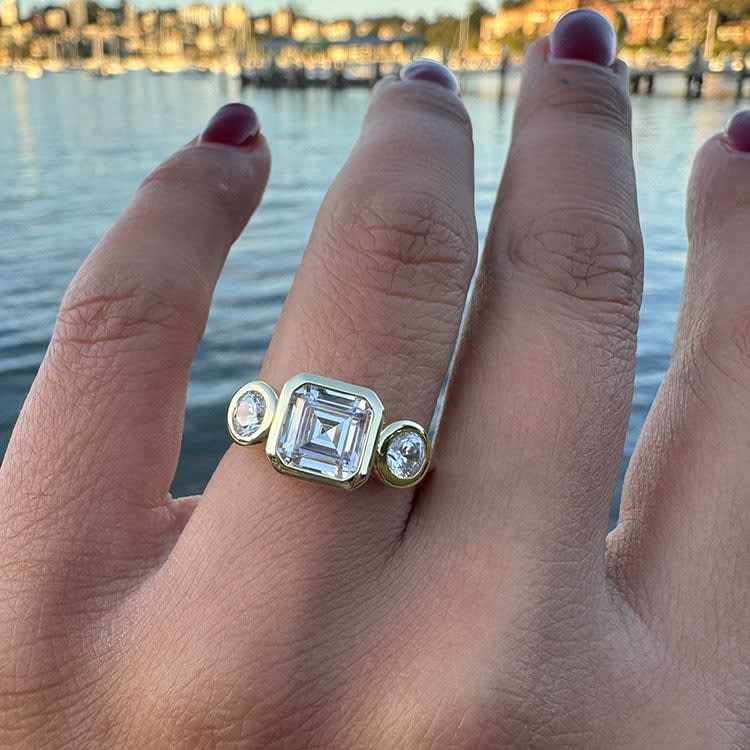 Solid gold asscher cut trilogy ring