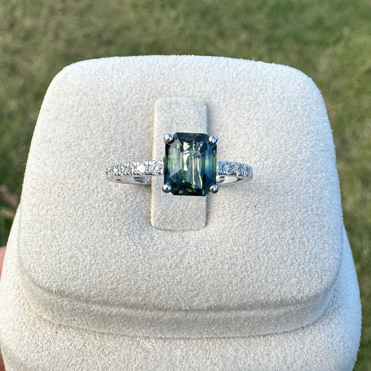 Natural teal sapphire and diamond ring White gold