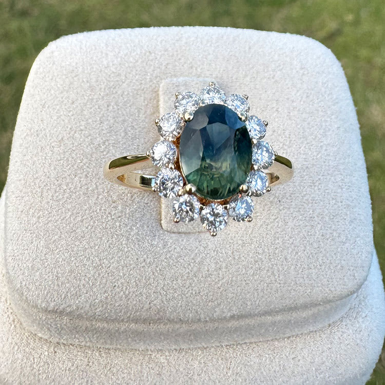 Oval Natural teal sapphire and diamond ring