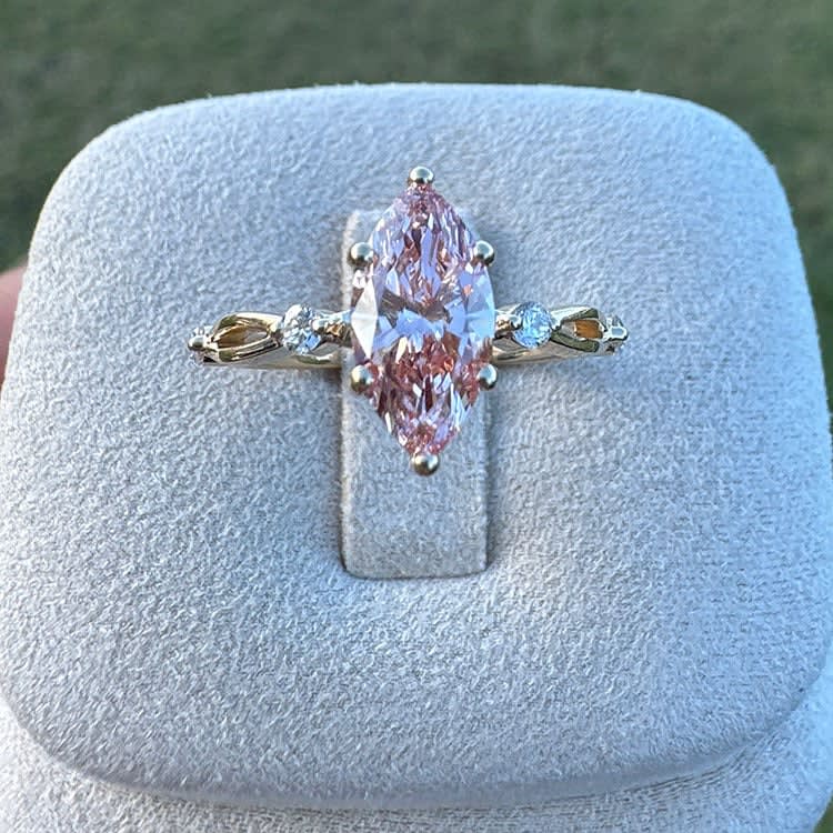 Fancy vivid pink marquise diamond ring