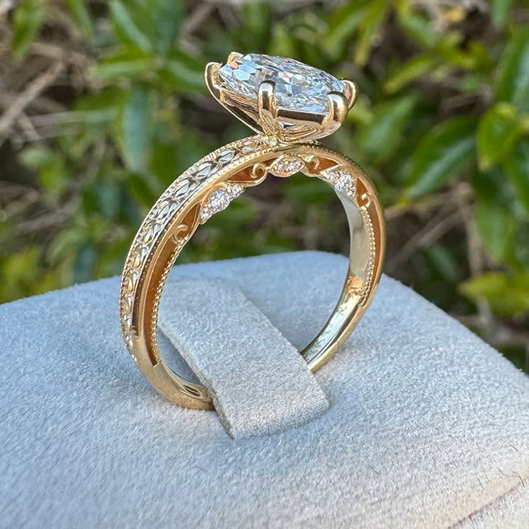 Step cut Dutch marquise on a carved band