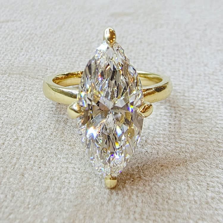 D VVS2 marquise set with hidden halo