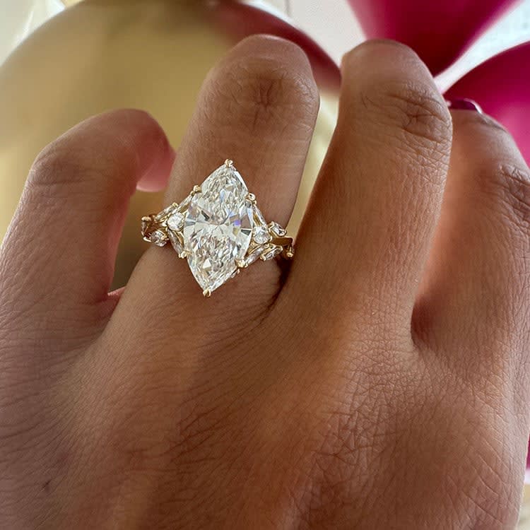 Marquise diamond ring with 3ct center stone