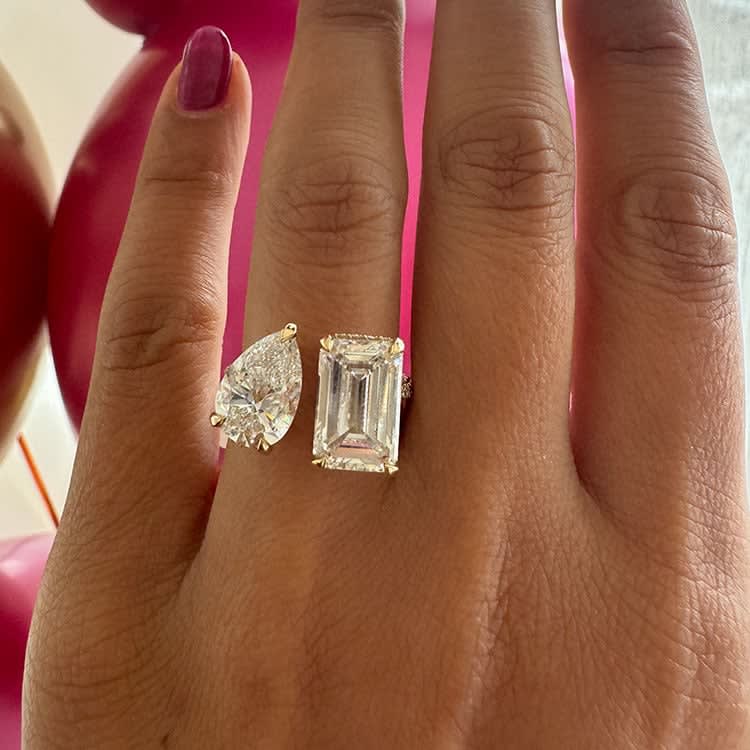 Emerald and pear diamond ring