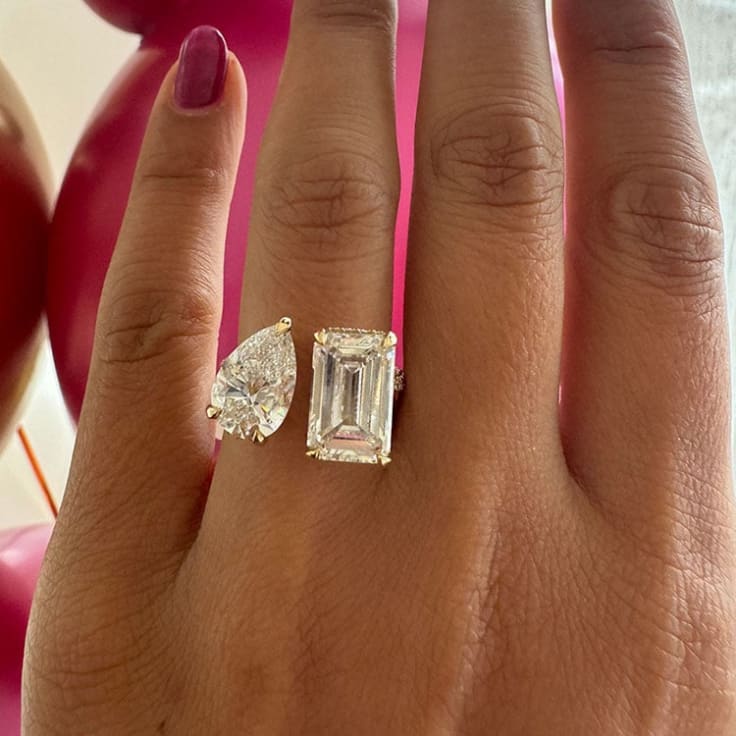 Emerald and pear diamond ring
