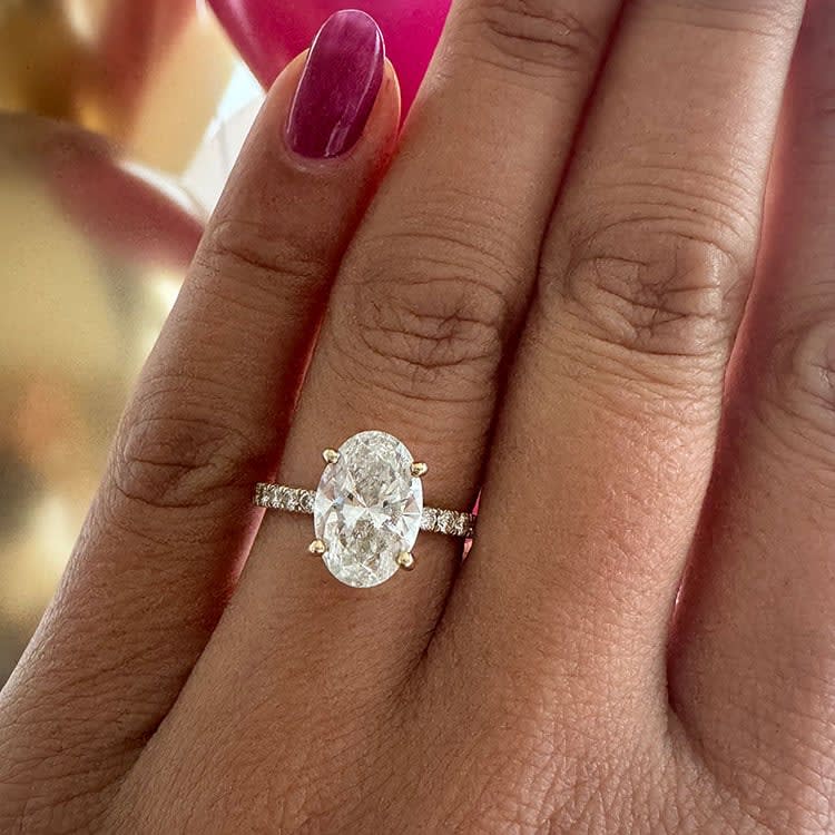 3ct oval lab diamond on a diamond band