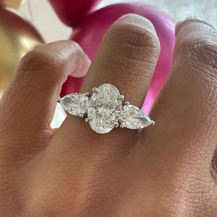 Oval with pear trilogy ring
