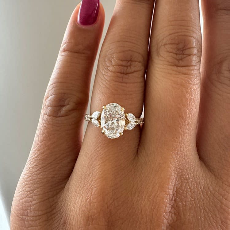 2 carat oval with marquise on the side