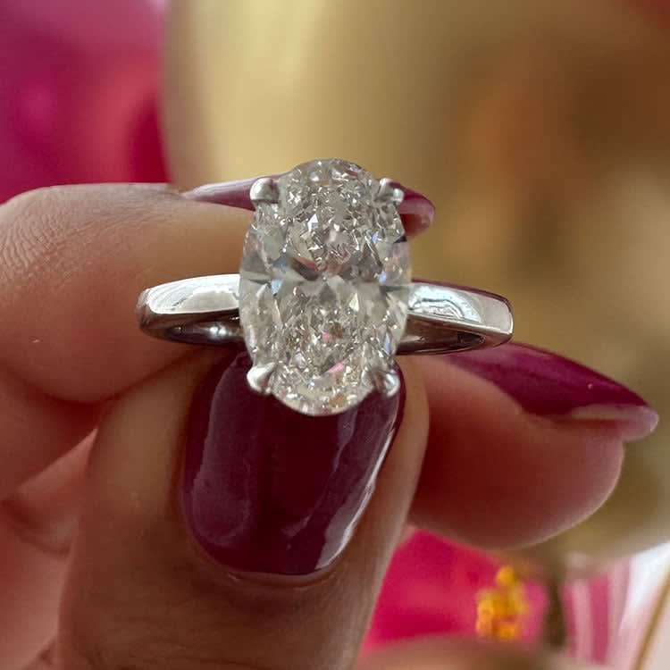 Classic 2 carat oval with a hidden halo