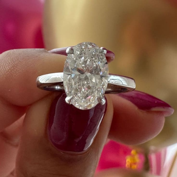 Classic 2 carat oval with a hidden halo