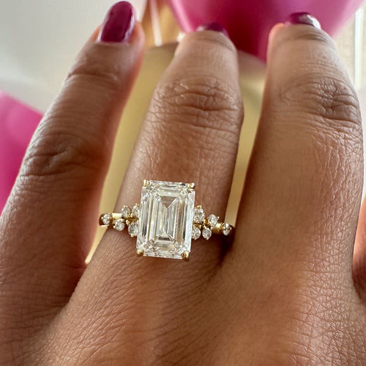 3 carat emerald with diamond band