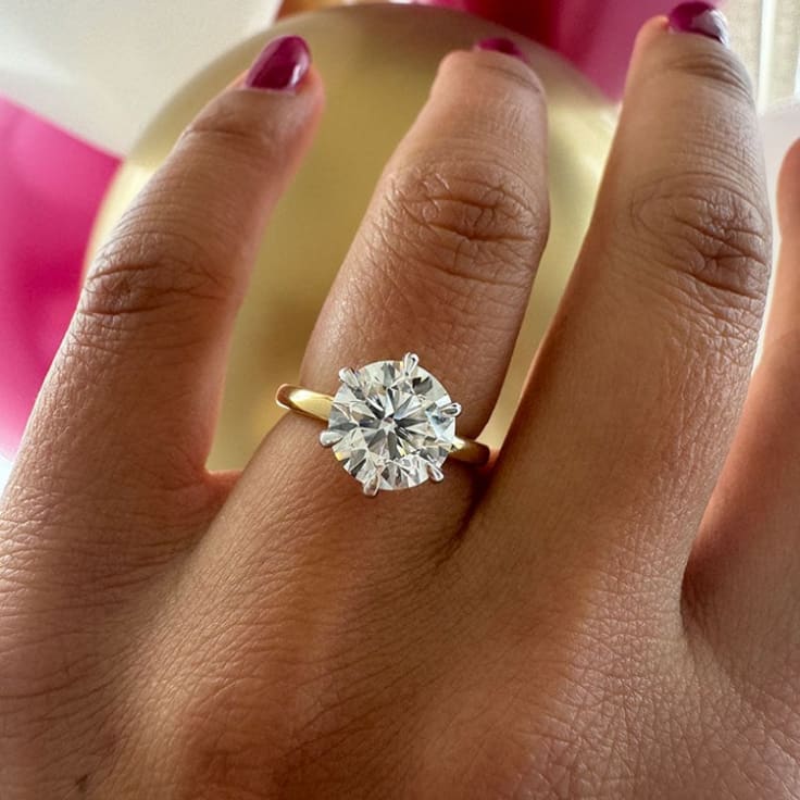 3 carat round brilliant diamond on two tone setting