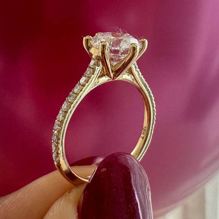 Classic round diamond with cathedral setting