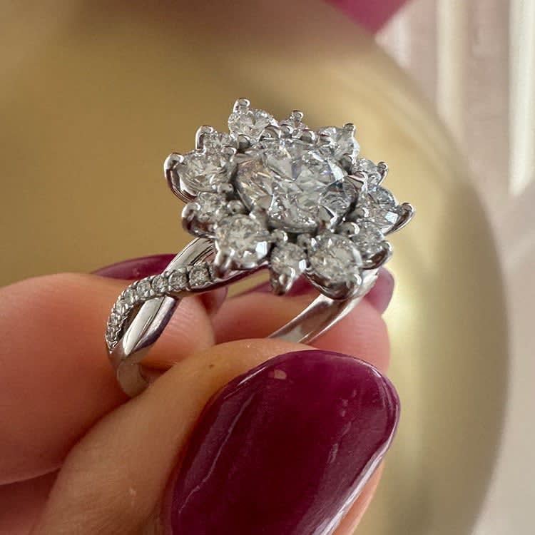 Floral design with 1ct center stone