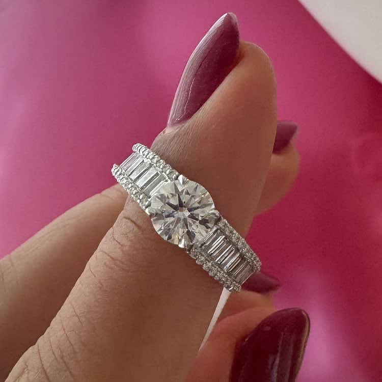 Round diamond with baguette ring