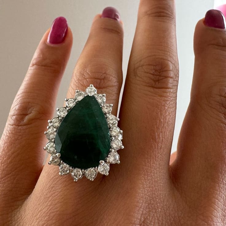 Natural emerald and diamond ring