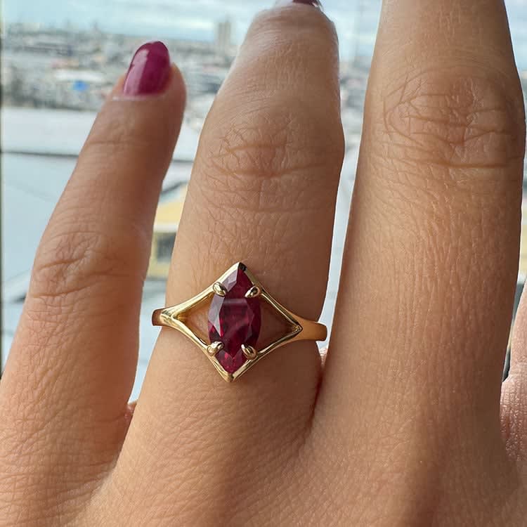 Marquise lab Ruby on split gold band