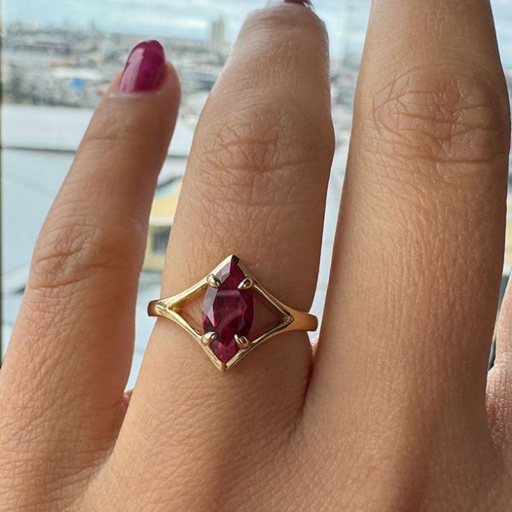 Marquise lab Ruby on split gold band