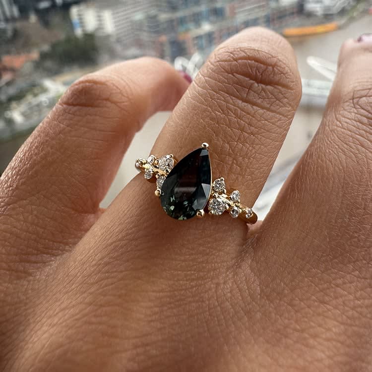 Natural green sapphire and diamond ring