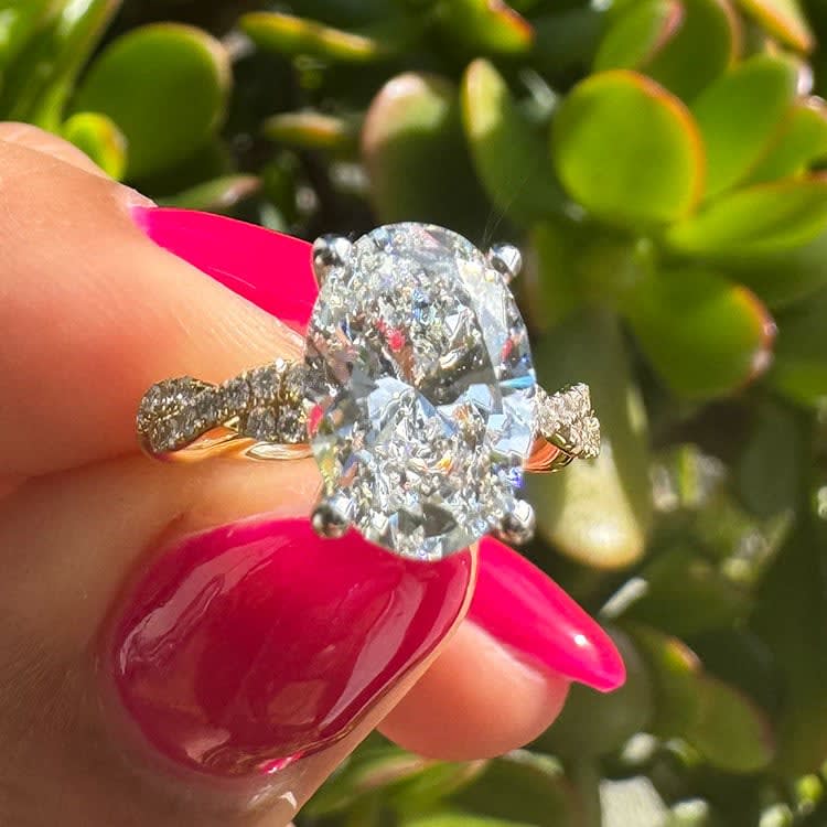 Oval on a twisted band engagement ring