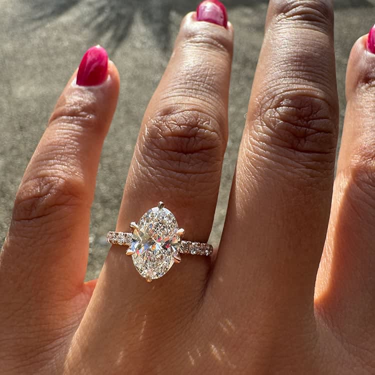 2 carat E VVS2 oval with tulip setting