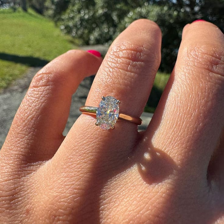 1 carat oval diamond on a gold band