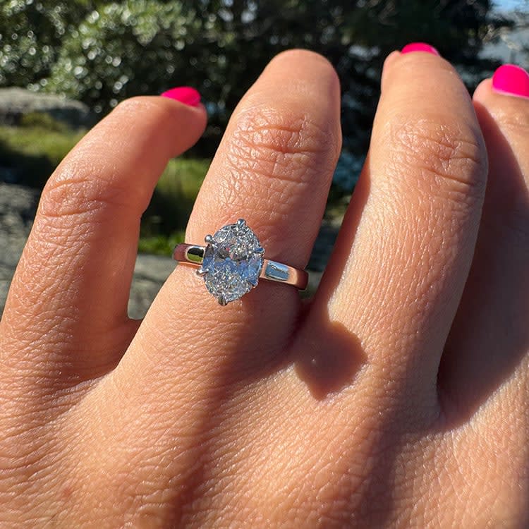 Oval diamond with a floating halo