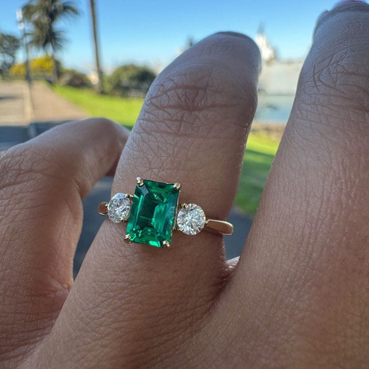 Lab green emerald with white diamonds