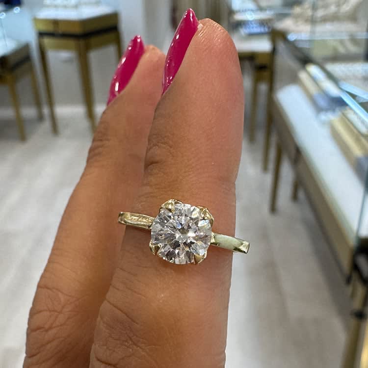 14k gold solitaire ring