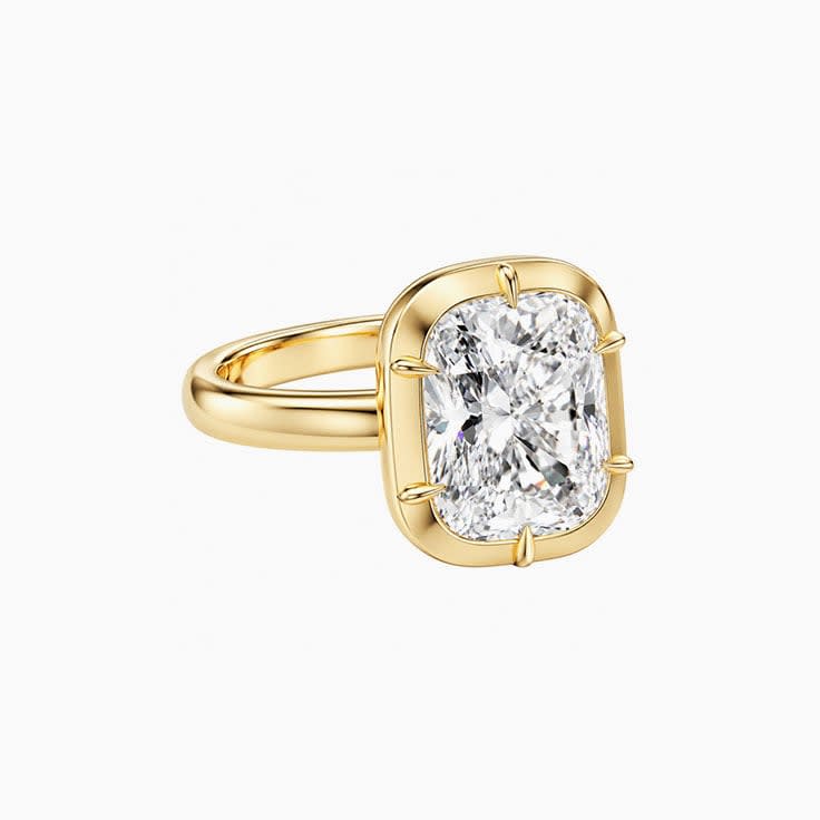 Cushion cut set on a solid setting