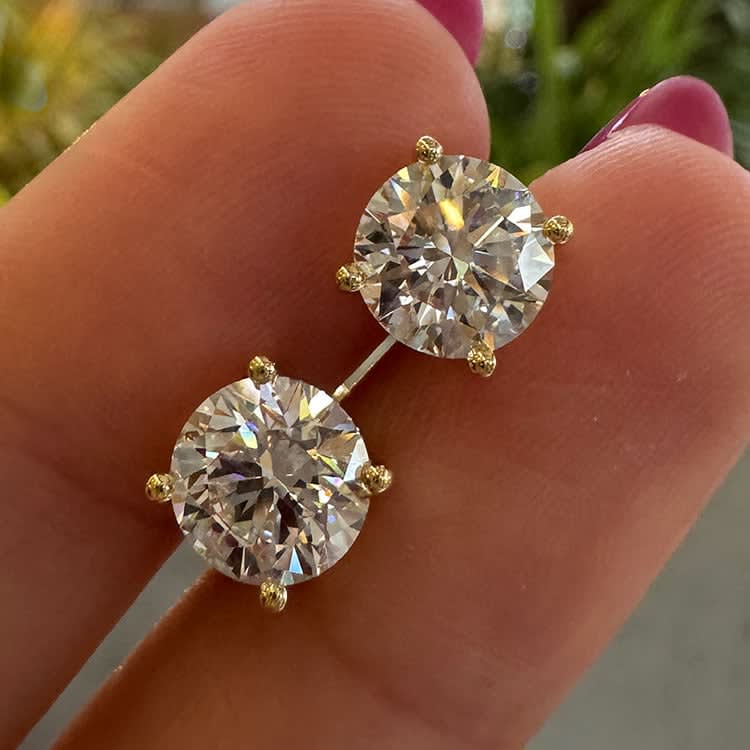 2 Carat D VVS2 each yellow gold studs