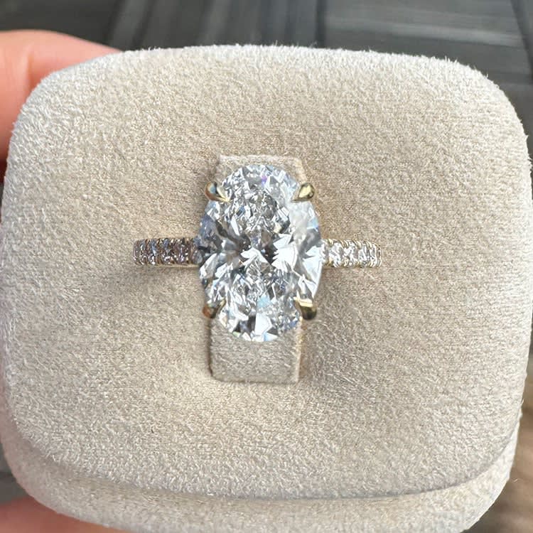 Yellow gold oval lab diamond with diamond band