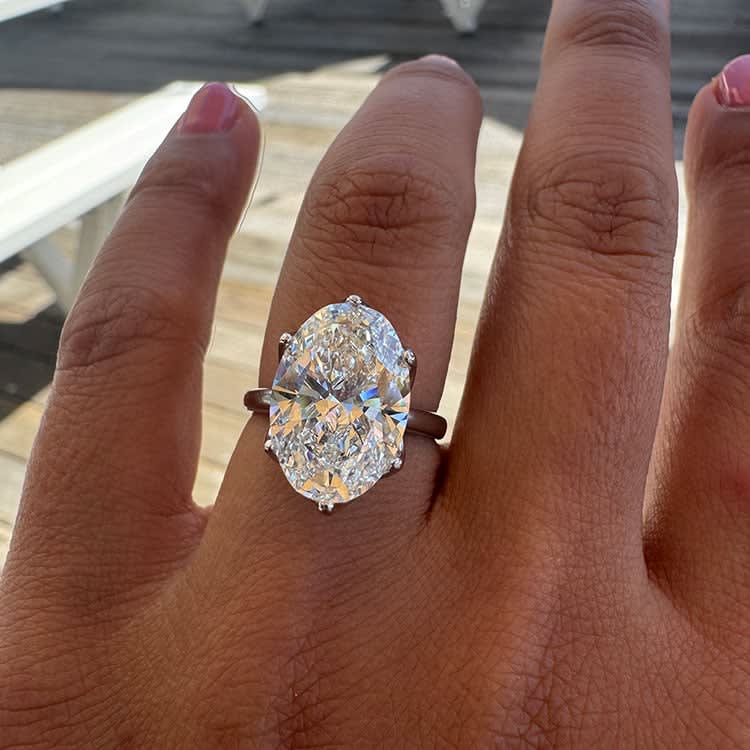 6 carat oval set in tulip setting