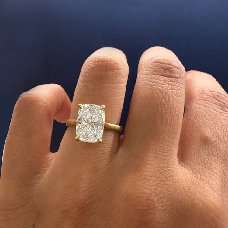 4 carat cushion lab Diamond on a plain band