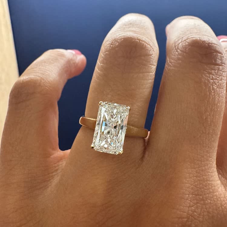 3 carat elongated radiant with hidden halo