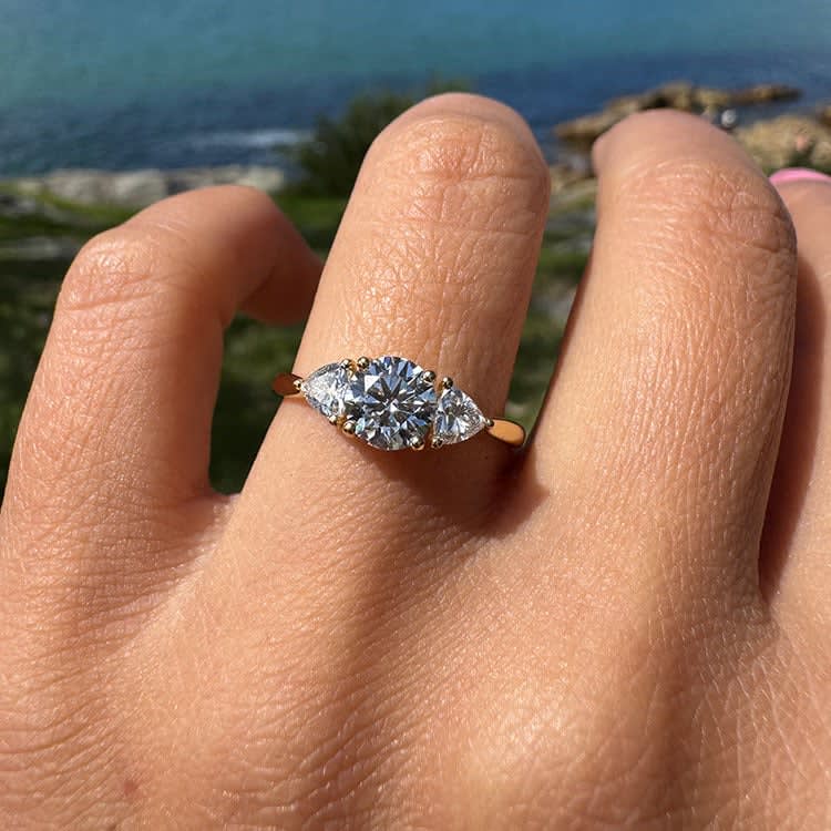 1 carat D VS1 round diamond in trilogy setting