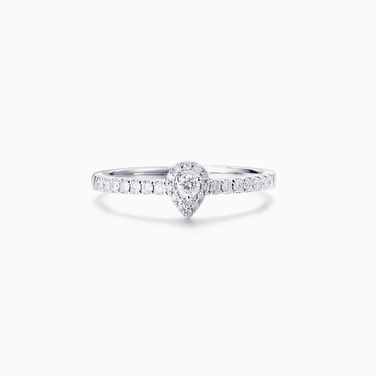 Round diamond with a Pear diamond Halo Engagement ring