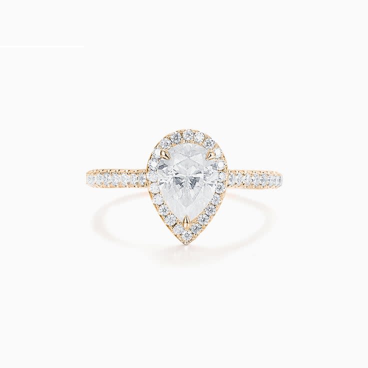 Pear Cut Diamond Engagement ring with a Diamond Halo