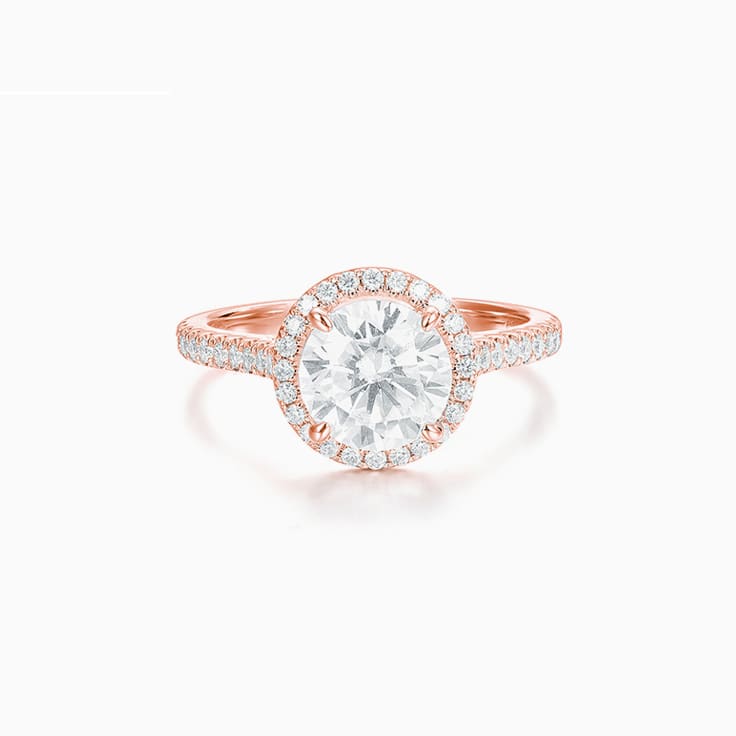Classic Round Brilliant Engagment ring with a Diamond Halo