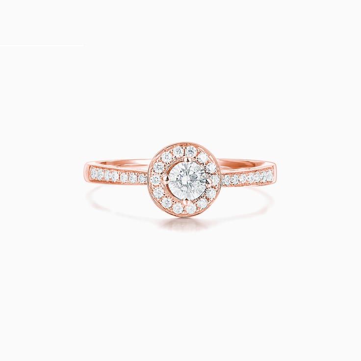 Round Brilliant cut diamond with a pave halo Engagement ring