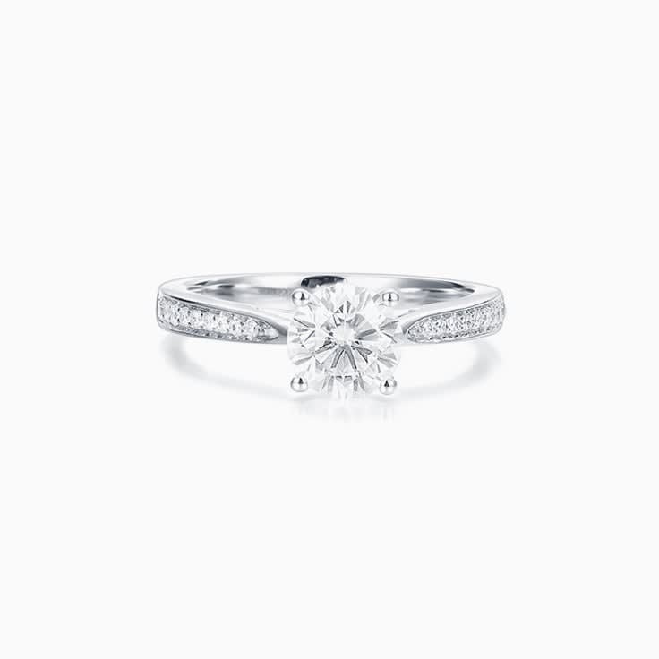 Round Brilliant cut Solitaire with a pave band Engagement Ring