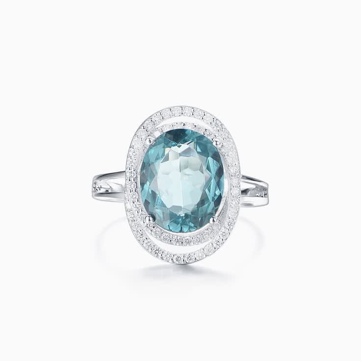 Blue topaz and diamond ring