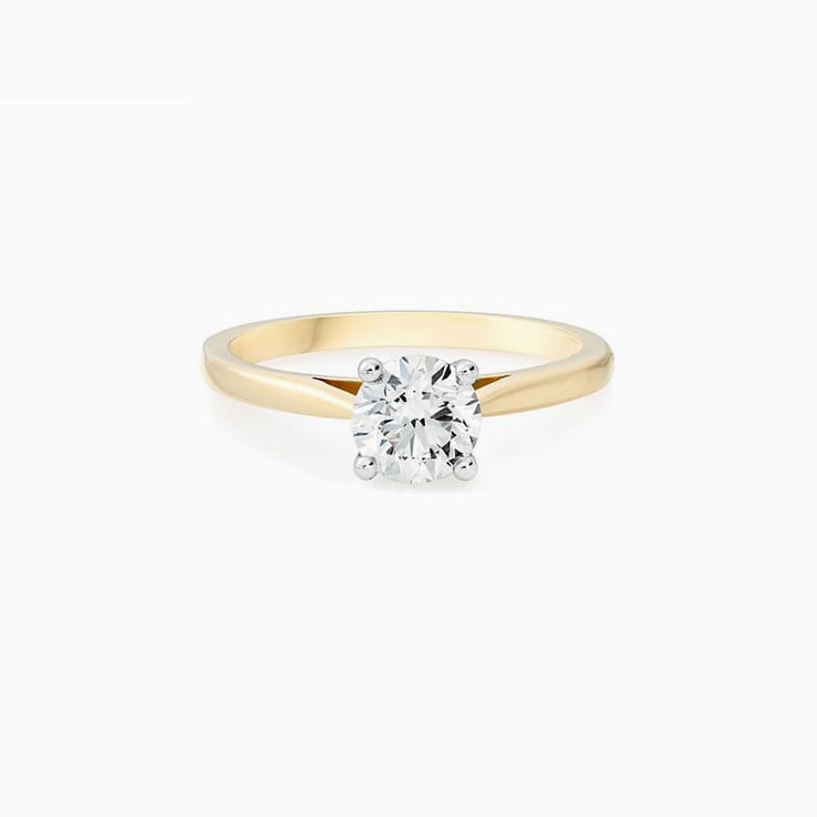 Round brilliant cut engagement ring in a four claw setting