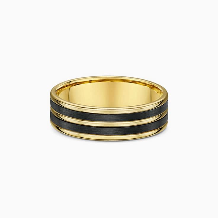 Carbon fibre stripped on gold ring