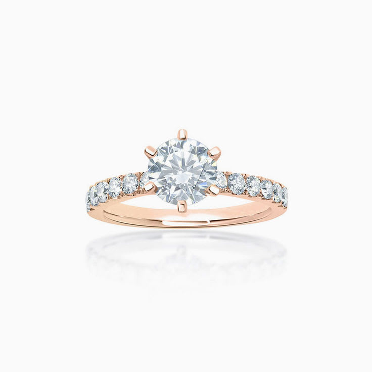 Six claw round brilliant cut engagement ring