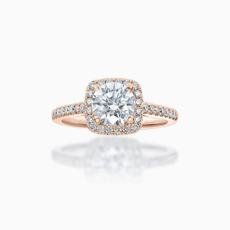 Round Brilliant cut cushion halo engagement ring