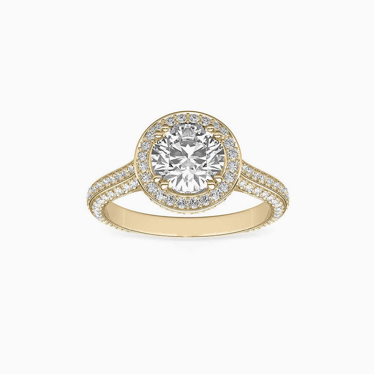 Round brilliant cut diamond set in a 3D halo engagement ring